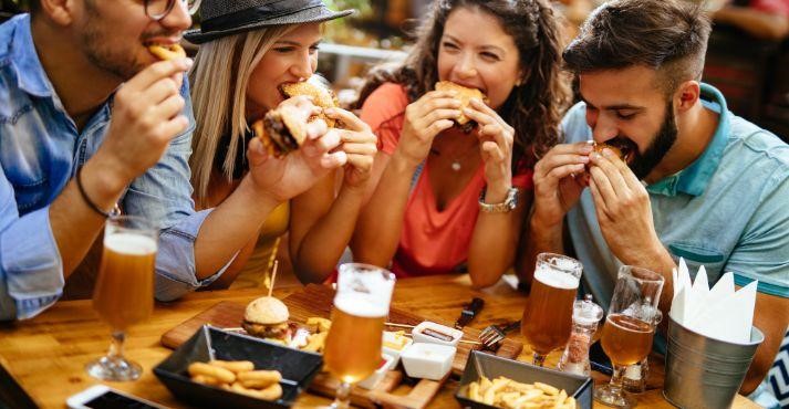 Group-of-friends-enjoying-fast-food